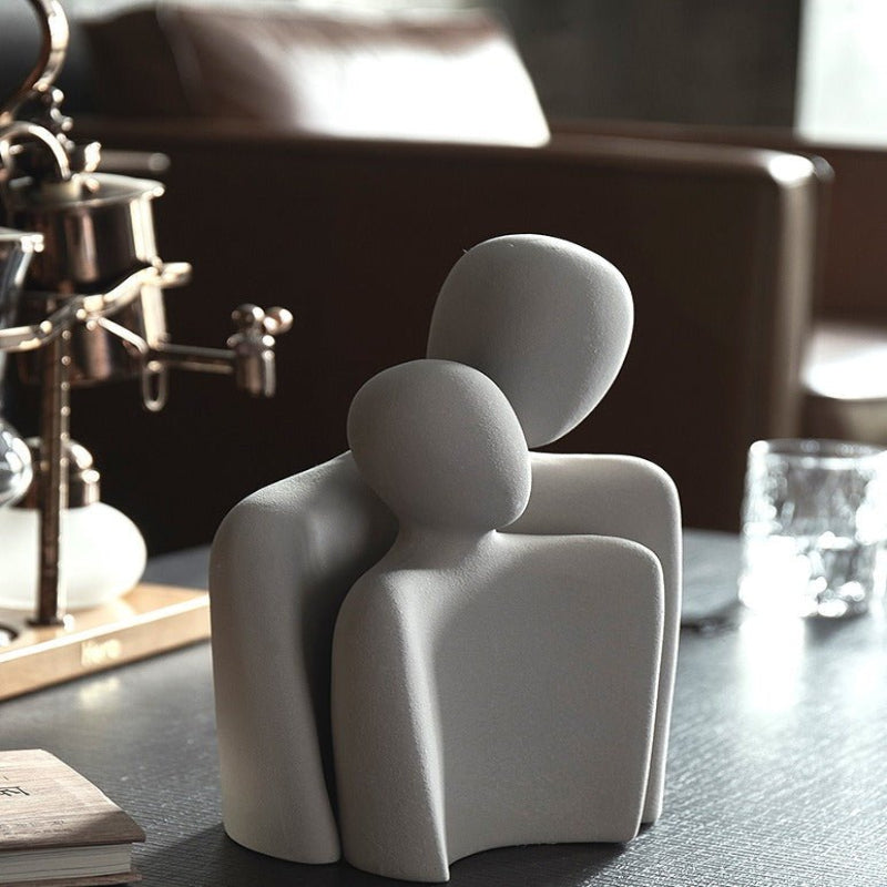 Modern sculpture symbolizing connection and tenderness