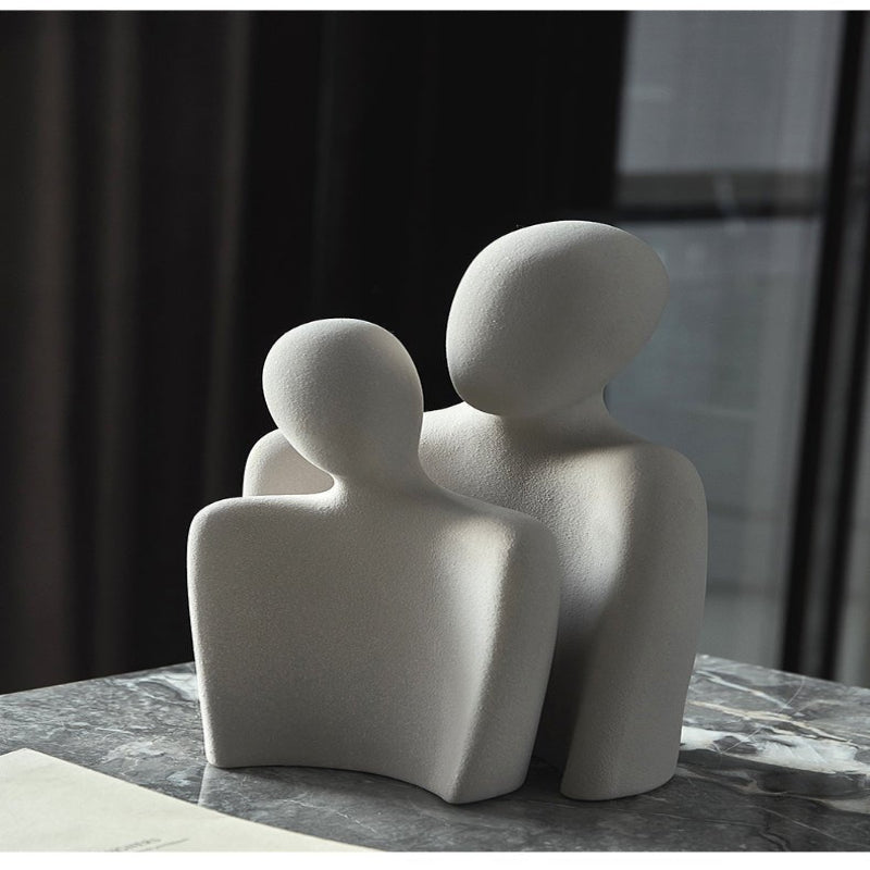 Modern sculpture symbolizing connection and tenderness